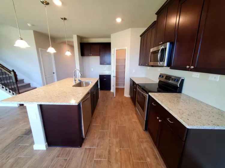 4 Bedroom 2 5 Bath Home with 2 Living Spaces Granite Counters and Stainless Steel Appliances