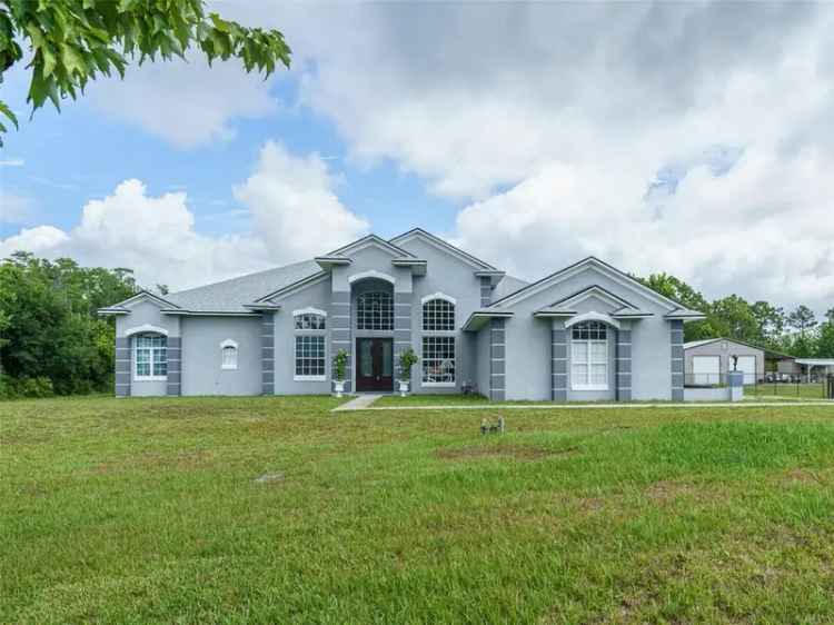 Single-family house For Sale in Wedgefield, Florida