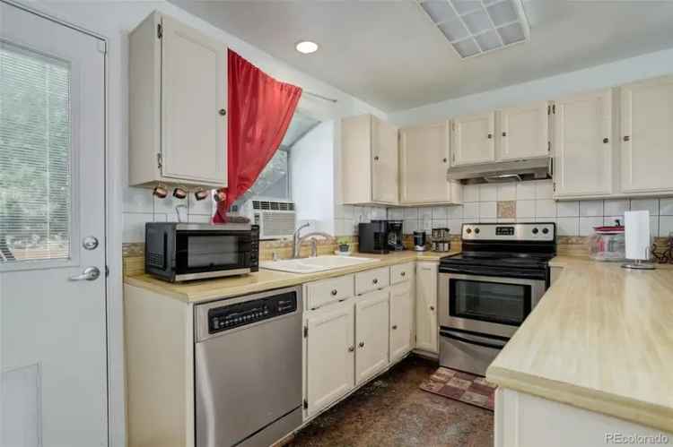 Condo For Sale in 16941, East Chenango Avenue, Aurora, Colorado