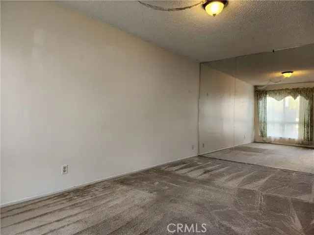 House For Sale in 7540, College Drive, Stanton, California