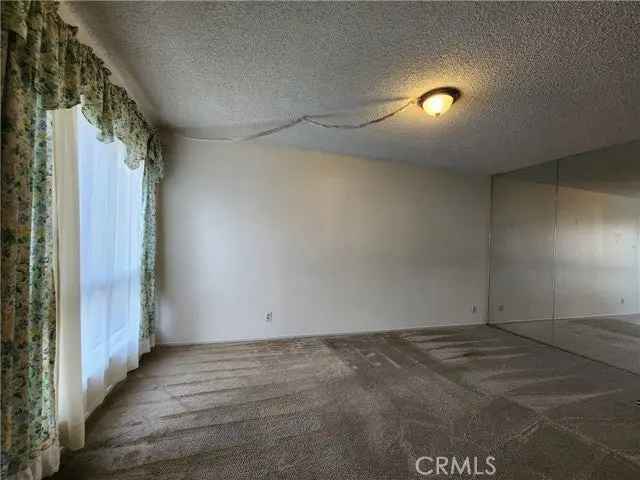 Single-family house For Sale in 7540, College Drive, Stanton, California