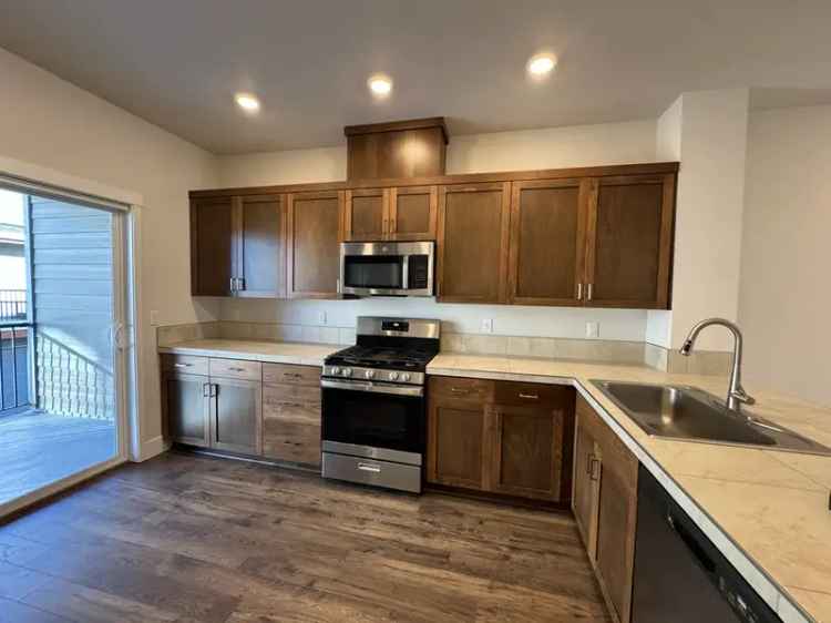 Bethany Crossing Townhome for Rent - Open Layout, Private Baths, 2-Car Garage