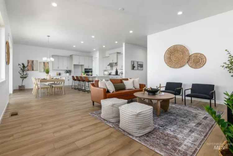 The Bramley 3-Car Garage Home with Fireplace and Covered Patio