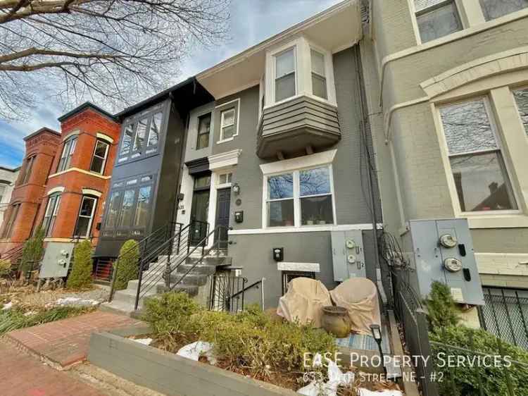 Capitol Hill 1 Bed 1.5 Bath Apartment - Parking Included